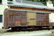 RhB - Gb 5807 am 05.09.1996 in Poschiavo - Gedeckter G�terwagen 2-achsig mit 1 offenen Plattform - Baujahr 1911 - SIG - Gewicht 7,25t - Zuladung 15,00t - L�P 8,54m - zul�ssige Geschwindigkeit Aufkleber 70 km/h - �2=10.12.1990 - Lebenslauf: exBB K 218 - 1942 RhB K 5413 - 1962 K� 5807 - 1969 Gb 5807 - 12/1996 Abbruch.
