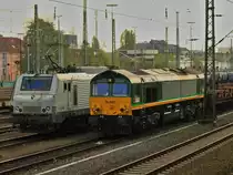 RL001 (266 031-4) kommt am 12.04.2014 mit einem leerem Coilzug aus Belgien nach Aachen West und übernimmt den vollen Coilzug von E37 528 auf dem Nachbargleis um diesen wieder nach Belgien zu schleppen.