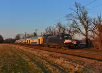 182 509 mit einem Meridian-Ersatzzug nach Kufstein am 11.03.2014 bei Happing.