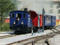 Dampfzug bei der Einfahrt in den Bahnhof von Gletsch mit HG 2/3  6 Weisshorn + 3 Personenwagen am 09.09.2006