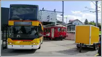 Zusammenarbeit von PAG (PostautoAG) und RHB im Depot Heiden, ABDeh2/4 23 teilt sich die Halle zur Zeit mit dem Neoplan Doppelstöcker. (14.04.2014)