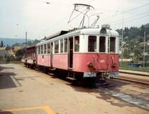 Triebwagen BDe 4/4 101 mit G�terwagen noch mit CEV Beschriftung im Bahnhof von Bloney im Juni 1983