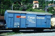 RhB - Gbk-v 5504 am 15.05.1994 in Thusis - Gedeckter G�terwagen 2-achsig mit 1 offenen Plattform CARGO DOMICIL - Baujahr 1911 - LOUV/RhB - Gewicht 6,86t - Zuladung 12,50t - L�P 8,49m - zul�ssige Geschwindigkeit 65 km/h - �2=01.05.1984 - Beschriftung: rh�toromanisch - Lebenslauf: ex K1 5504 - 1969 Gbk 5504 - 1976a - 1977 Gbk-v 5504 - Hinweis: gescanntes Dia
