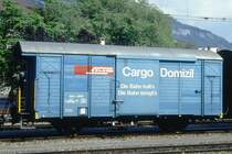 RhB - Gbk-v 5506 am 13.05.1994 in Chur - Gedeckter G�terwagen 2-achsig mit 1 offenen Plattform CARGO DOMIZIL - Baujahr 1911 - LOUV/RhB - Gewicht 6,84t - Zuladung 12,50t - L�P 8,49m - zul�ssige Geschwindigkeit 75 km/h - �2=07.02.1990 - Beschriftung: deutsch - Lebenslauf: ex K1 5506 - 1969 Gbk 5506 - 1975 Gbk-v 5506
