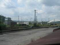 Hagen-G�terbahnhof 02.12.2006.

Links befindet sich das Stellwerk Hgf.

Weiter rechts im Bild der gro�e wei�e Halbbogen ist die Fuhrparkbr�cke in Hagen

Ich befinde mich gerade in der Ladestra�e zum verwiegen von Schrottwagen...