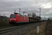 Am 14.02.2014 bespannte 185 115-3 einen  gemischten Güterzug, als sie in den Bahnhofsbereich von Müllheim (Baden) in nördliche Richtung einfuhr.
