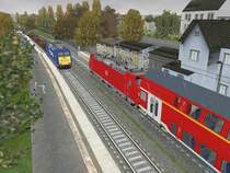 Eine 146.1 der DB regio trifft in Schallstadt auf einen G�terzug der von der Connex 185 CL 001 gezogen wird