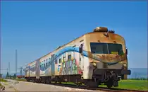 SŽ 813-130 fährt durch Cirkovce Richtung Hodoš. /6.5.2014