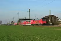 146 114-4 mit einem RE von Offenburg nach Basel Bad. Bf am Nachmittag des 29.03.14 beim Verlassen des Haltepunktes Auggen.