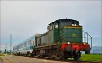 SŽ 642-179 zieht zwei lehre Personenwagons durch Cirkovce Richtung Ptuj. /9.5.2014