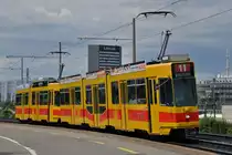 Be 4/8 215 und der Be 4/6 258 kurz vor der Haltestelle M-Parc. Die Aufnahme stammt vom 10.05.2014.