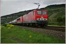 MRG 605+ 705 (143 344-0 +155 196-9) mit einen Zementzug Richtung Würzburg bei Thüngersheim am 08.05.14.