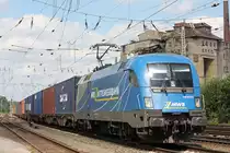 MWB 182 912 am 6.8.13 mit einem Containerzug in Verden (Aller).
