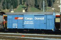 RhB - Gbk-v 5528 am 10.05.1994 in Davos Platz - Gedeckter G�terwagen 2-achsig mit 1 offenen Plattform CARGO DOMIZIL - Baujahr 1911 - LOUV/RhB - Gewicht 6,85t - Zuladung 12,50t - L�P 8,49m - zul�ssige Geschwindigkeit 75 km/h - Beschriftung: deutsch - Lebenslauf: ex K1 5528 - 1969 Gbk 5528 - 1976a - 1977 Gbk-v 5528 - Hinweis: gescanntes Dia
