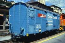 RhB - Gbk-v 5529 am 31.08.1993 in St.Moritz - Gedeckter G�terwagen 2-achsig mit 1 offenen Plattform CARGO DOMIZIL - Baujahr 1911 - LOUV/RhB - Gewicht 7,62t - Zuladung 12,50t - L�P 8,49m - zul�ssige Geschwindigkeit 75 km/h - �2=15.04.1987 - Beschriftung: deutsch - Lebenslauf: ex K1 5529 - 1969 Gbk 5529 - 1976 Gbk-v 5529 - 05/1997 Abbruch - Hinweis: gescanntes Dia
