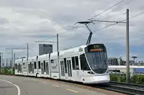 Be 6/10 Tango 166 mit der Clariant Werbung auf der Linie 10 kurz vor der Haltestelle M-Parc. Die Aufnahme wurde von einer Insel mitten auf der Strasse gemacht. Die Aufnahme stammt vom 10.05.2014.