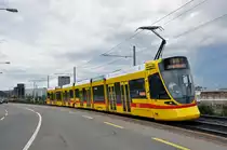 Be 6/10 Tango 161 auf der Linie 10 kurz vor der Haltestelle M-Parc. Die Aufnahme wurde von einer Insel mitten auf der Strasse gemacht. Die Aufnahme stammt vom 10.05.2014.