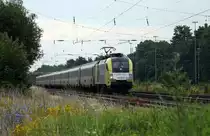 Taurus Boxxpress ES64U2-025 mit dem morgendlichen HKX 1800 nach Köln bei der Durchfahrt in Hasbergen. Der Zug bestand an diesem Tag durchgängig aus ehemaligen belgischen Schnellzugwagen.