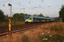 Hasbergen am 21.7.2014 um 6.34 Uhr: Einfahrt Westfalenbahn ET 019 aus Münster auf dem Weg nach Osnabrück.