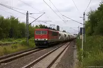 MEG 702 (155 179-5) Mitteldeutsche Eisenbahn GmbH mit einem Zementzug von Rüdersdorf nach Rostock-Seehafen, bei der Durchfahrt in Berlin-Hohenschönhausen. 24.07.2014 (Fotostandort: Bahnsteigende)