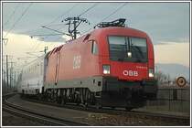 1116 077 mit dem EC 104  Sobieski  von Wien-S�d nach Warszawa Wschodnia am 9.12.2006 bei der Querung der Donau, aufgenommen in der Wiener Lobau.