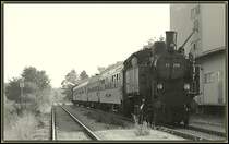 77.250 (ex. �BB 77.244) als Schublok des IGE Dampfsonderzuges R 16632 von Floridsdorf nach Laa a.d.Thaya am 22.9.2006 beim Halt in Haugsdorf.