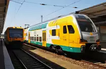 Hier links 650 070-5 als RB60 (RB79553) von Berlin Lichtenberg nach Frankfurt(Oder) und rechts 445 110-0 als RE2 (RE92966) von Berlin Lichtenberg nach Cottbus, diese beiden Triebzüge standen am 19.7.2014 in Berlin Lichtenberg 