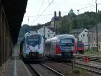 1442 112 als S5 nach Zwickau und Erzgebirgsbahn 642 058 am 20.08.2014 im Bahnhof Gößnitz.