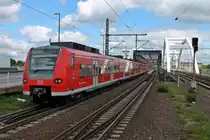 Einfahrt am 24.05.2014 von 425 721-8 zusammen mit 425 727-5 (425 225-0) als S2 nach Kaiserslautern in Ludwigshafen (Rhein) Mitte.