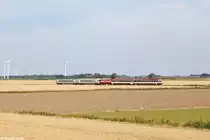 NEG 628 mit zwei IC Kurswagen am 25.07.2014 zwischen Dagebüll und Niebüll.
