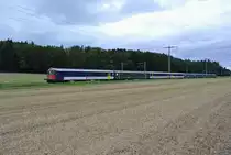 Ersatz RE 3226 zwischen Lyssach und Hindelbank. Der Berner EWII Pendel verkehrte mehrmals zwischen Bern und Olten. An der Spitze ist der BDt EWI 50 85 82-33 992-7, hinten schiebt die Re 4/4 II 11215. Ein B und ein A wurden durch NPZ Wagen ersetzt, 31.08.2014.