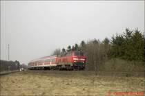 Bei der Ausfahrt aus St.Michaelisdonn legte sich RE 35017 Westerland(Sylt)-Hamburg-Altona im Fr�hjahr 2003 mit 100km/h in die Kurve.