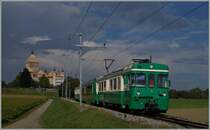 Der BAM Be 4/4 N° 11 mit dem Regionalzug 127 von Bière nach Morges zwischen Vufflens le Château und Chigny. 
8. Sept. 2014