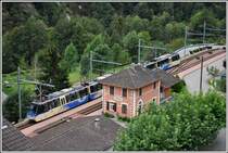 Der Treno Panoramico kegt einen kurzen Grenzhalt ein in Camedo. Diese Züge sind im oberen Teil dermassen abgeschrägt, dass jedes Bild irgendwie schief wirkt. (03.09.2014)