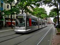 Straßenbahnlinie 709 nach Düsseldorf-Grafenberg Staufenallee an der Haltestelle Neuss Schwannstraße.(10.9.2014)
