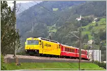 RE1041 nach Davos Platz mit Ge 4/4 III 644 bei Landquart. (25.09.2014)