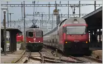 Re 6/6 11604 und IC569 mit 460 094-6 in Landquart. (25.09.2014)