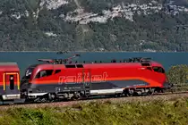 1116 211-4 Spirit of Munich an der Zugspitze des Railjet von Zürich HB nach Wien Hbf am 23.9.2014 bei Mühlehorn am Walensee.