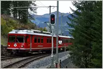 Der Be 4/4 515 Pendelzug verkehrt als RE1043 auf der kurzen Strecke von Klosters nach Davos Platz, hier in Cavadürli. (14.10.2014)