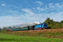 . Zu Besuch beim Dampffestival 2014 der belgischen Museumsbahn CFV3V (Chemin de Fer � Vapeur des trois Vall�es) - Im angenehmen Morgenlicht des 28.09.2014 f�hrt der erste Dampfzug �ber die abwechslungsreiche Strecke der Museumsbahn CFV3V (Chemin de Fer � Vapeur des trois Vall�es) und begegnet mir zwischen Olloy-sur-Viroin und Vierves-sur-Viroin. Er wird gezogen von der sch�nen Polin PKP TKt 48-87 (BJ 1952) und der betagten Belgierin AD 05 Tubize N� 2007 (Bj 1926). (Hans)