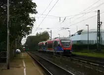 Ein Nachschuss von der Euregiobahn (RB20) aus Langerwehe-Stolberg-Altstadt nach Heerlen(NL) aus Richtung Aachen-West,Laurensberg,Richterich und hilt in Kohlscheid und fährt in Richtung Herzogenrath. 
Bei Sonne und Wolken am Morgen vom 23.10.2014.