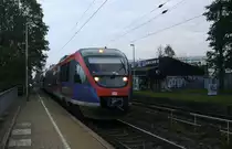 Die Euregiobahn (RB20) kommt aus Heerlen(NL)-Stolberg-Altstadt-Düren und kommt die Kohlscheider-Rampe hoch aus Richtung Herzogenrath und hält in Kohlscheid und fährt in Richtung Richterich,Laurensberg,Aachen-West.
Bei Sonne und Wolken am Morgen vom 23.10.2014.