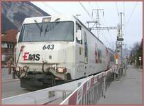 Ge 4/4 III  Vals  mit Werbung Ems Chemie verl�sst Domat/Ems mit dem Glacier-Express Richtung St.Moritz. (11.01.2007)