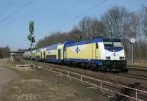 Noch deutet nur die Absperrung auf den unmittelbar bevorstehenden Beginn des dreigleisigen Streckenausbaus hin: ME 146 537 mit MEr 81615 (Hamburg-Harburg–L�neburg) am 29.03.2011 in Radbruch