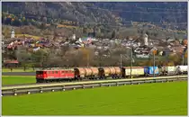 Ge 6/6 II 701  Raetia  mit einem Güterzug vor der Kulisse von Zizers. (20.11.2014)