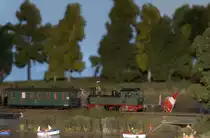 Badefreuden am Dippelsdorfer Teich, eine typische Sächsische Meyer Lok passiert gerade.Modelleisenbahnausstellung  Radebeul 23.11.2014 17:01 Uhr.