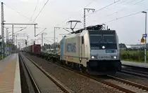Mit einem Containerzug am Haken fuhr 186 275 am 31.10.14 durch Rodleben Richtung Wittenberg.