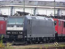 Zum Gl�ck hatte ich am 16.12.06 mein Stativ dabei,denn bei so Belichtungszeigen ist es nicht m�glich bei vollem Zoom scharfe Bilder zu machen.185 554 verweilt in Mannheim Rangierbahnhof.