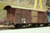 RhB - Gbk-v 5568 am 09.05.1991 in St.Moritz - Gedeckter G�terwagen 2-achsig mit 1 offenen Plattform - Baujahr 1913 - Reich - Gewicht 7,64t - Zuladung 12,50t - L�P 8,49m - zul�ssige Geschwindigkeit 75 km/h - �2=21.06.1990 - Lebenslauf: ex K1 5568 - 1969 Gbk-v 5568 - 08/2002 Abbruch - Hinweis: gescanntes Dia
