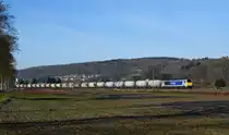 Die zu dem EVU Stock Transporte gehörende Voith Maxima 264 001 ist im Filstal auf dem Weg in Richtung Ulm mit ihren Staubgutwagen.Das Bild Aufgenommen bei Uhingen/Fils am 6.1.2015